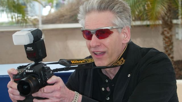 Mann mit Fotoapparat Mann mit Fotoapparat