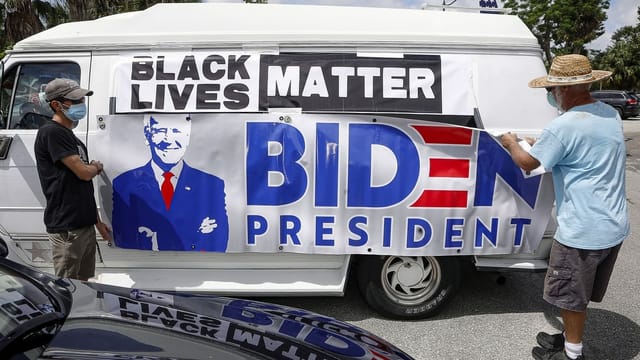 Biden-Anhänger auf dem Weg zu einer Black Lives-Matter-Demonstration. Biden-Anhänger auf dem Weg zu einer Black Lives-Matter-Demonstration.