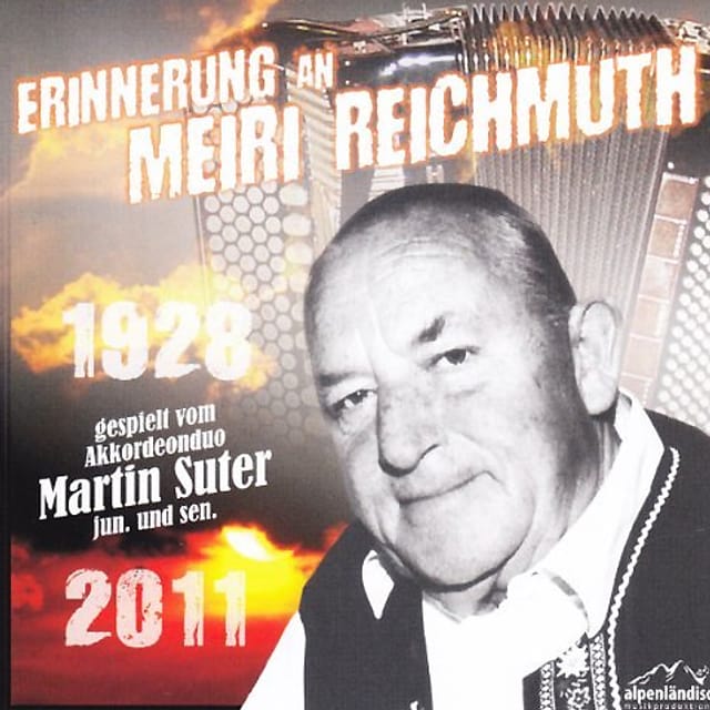 CD-Cover «Erinnerung an Meiri Reichmuth». Auf dem Cover ist ein Porträt von Meiri Reichmuth zu sehen und schwach im Hintergrund ein Akkordeon. CD-Cover «Erinnerung an Meiri Reichmuth». Auf dem Cover ist ein Porträt von Meiri Reichmuth zu sehen und schwach im Hintergrund ein Akkordeon.