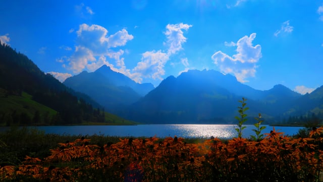 Schwarzsee mit viel blauem Himmel und ein paar Quellwolken. Schwarzsee mit viel blauem Himmel und ein paar Quellwolken.