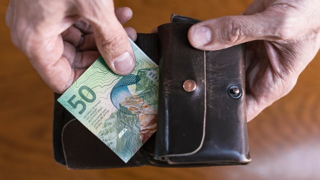 Geldbörse mit 50-Franken-Note. Geldbörse mit 50-Franken-Note.