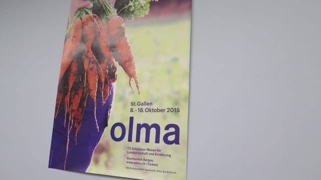 Werbeplakat der Olma mit einem Bild von Karotten Werbeplakat der Olma mit einem Bild von Karotten
