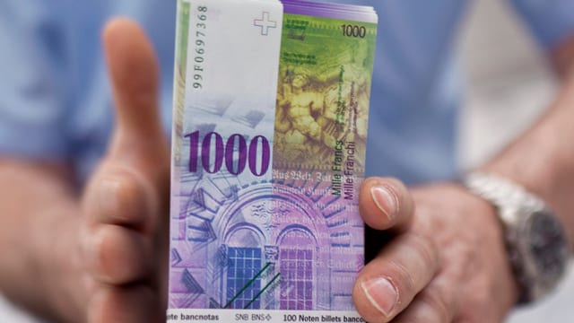 Ein Bündel 1000er Noten. Ein Bündel 1000er Noten.