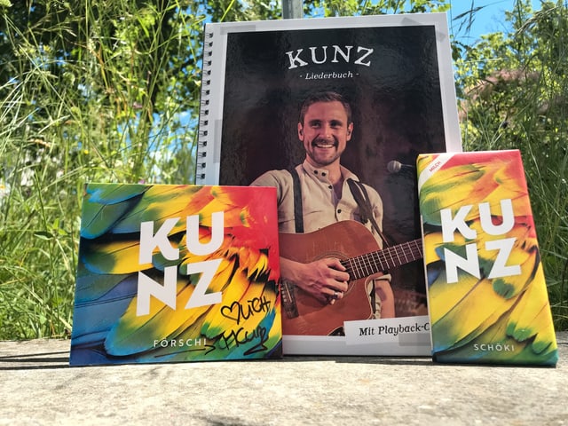 Kunz-CD, -Liederbuch und -Schokolade. Kunz-CD, -Liederbuch und -Schokolade.