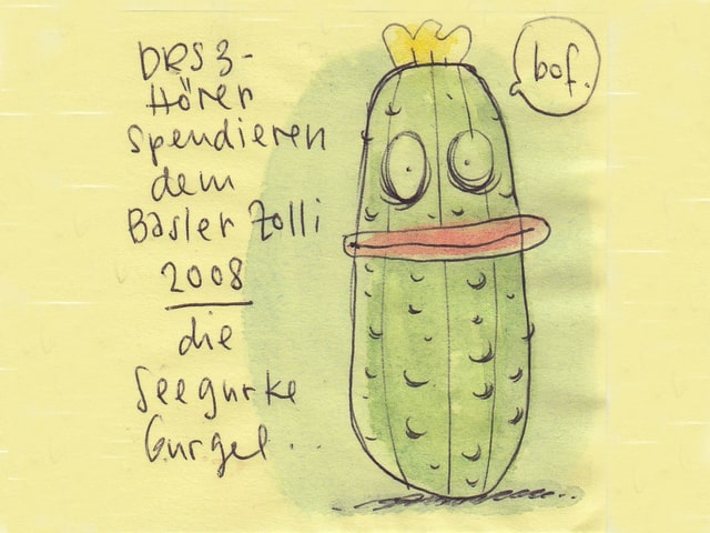 Zu sehen ist die gezeichnete Seegurke Gurgel. In der Sprechblase sagt sie: bof.