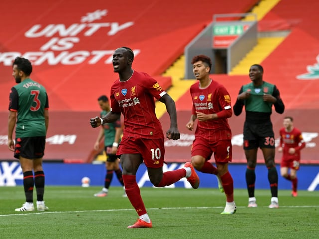 Sadio Mané jubelt über ein Tor. Sadio Mané jubelt über ein Tor.