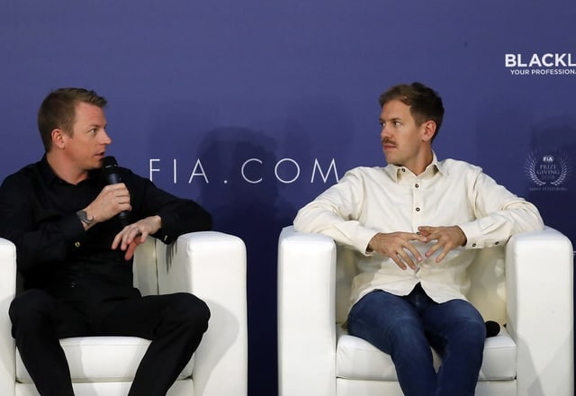 Kimi Räikkönen und Sebastian Vettel. Kimi Räikkönen und Sebastian Vettel.