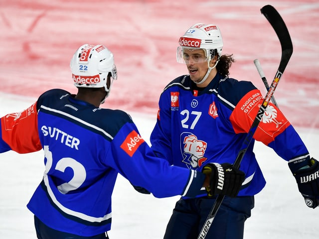 Dave Sutter und Roman Wick von den ZSC Lions. Dave Sutter und Roman Wick von den ZSC Lions.
