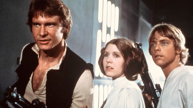 Eine Szene aus Star Wars mit Harrison Ford, Carrie Fisher und Mark Hamill Eine Szene aus Star Wars mit Harrison Ford, Carrie Fisher und Mark Hamill