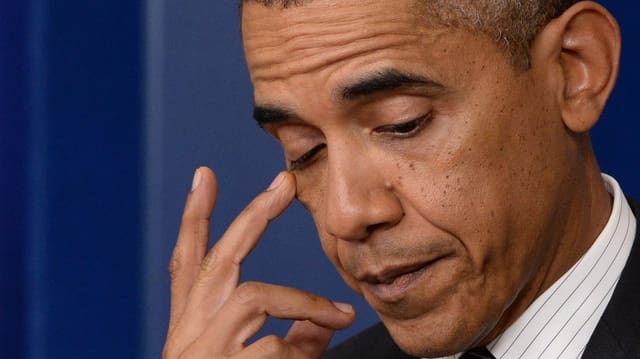 Porträt von einem nachdenklichen Barack Obama. Porträt von einem nachdenklichen Barack Obama.