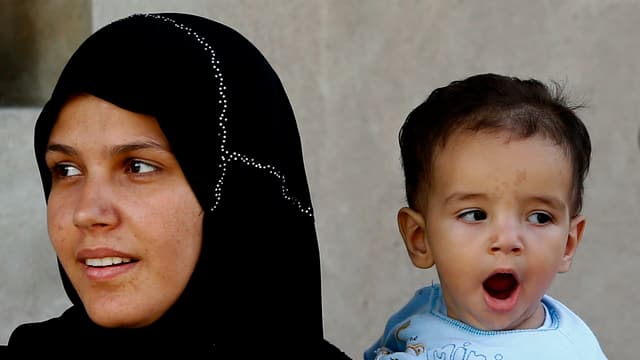 Syrische Frau mit Kopftuch. Syrische Frau mit Kopftuch.