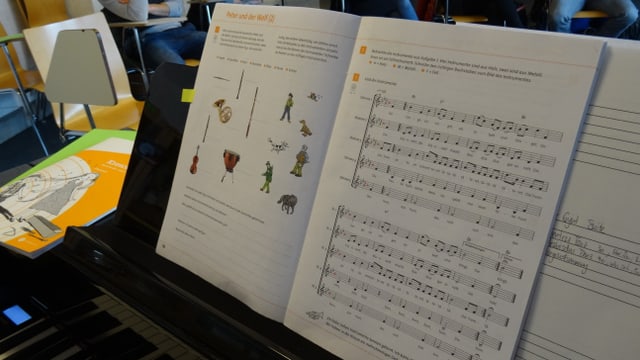 med d'instrucziun per chant e musica sin clavazin med d'instrucziun per chant e musica sin clavazin