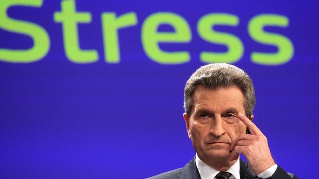 Günther Oettinger – im Hintergrund das Wort «Stress» Günther Oettinger – im Hintergrund das Wort «Stress»