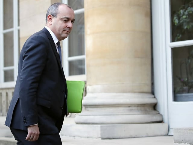 Laurent Berger läuft in ein Gebäude. Laurent Berger läuft in ein Gebäude.