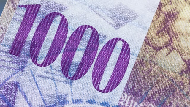 Ein Teil einer Tausendernote Ein Teil einer Tausendernote