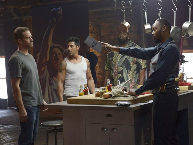 Paul Walker, David Belle und RZA an einem Küchentisch. Paul Walker, David Belle und RZA an einem Küchentisch.