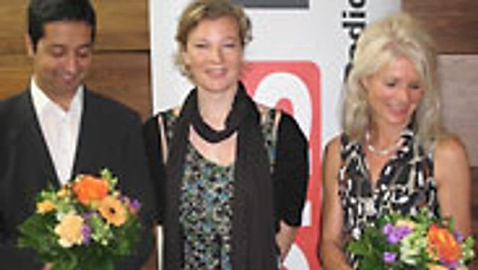 Karin Frei mit Waseem Hussain und Silvia Henke (r.).