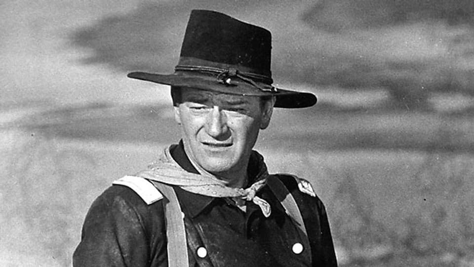 US-Schauspieler John Wayne waehrend der Drejarbeiten zu dem Film «The Horse Soldiers».
