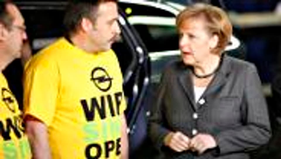 Bundeskanzlerin Merkel zu Besuch beim deutschen Sorgenkind Opel.