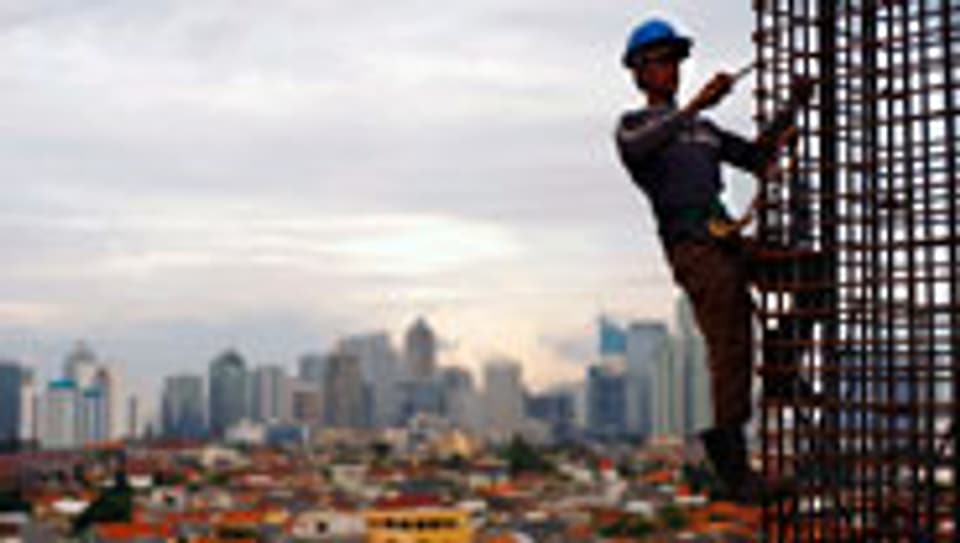 Immer höher hinaus? Bauarbeiter in Jakarta.