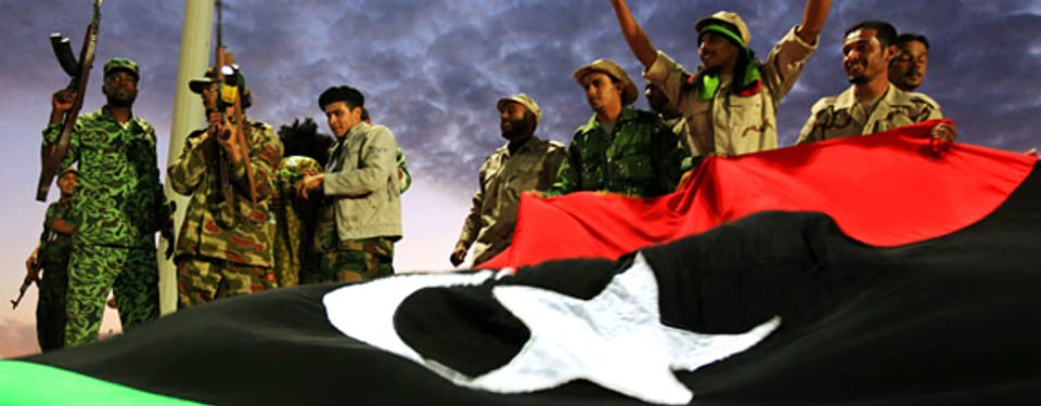 In Libyen feiern Gegner von Ghadhafi feiern ihren Sieg.