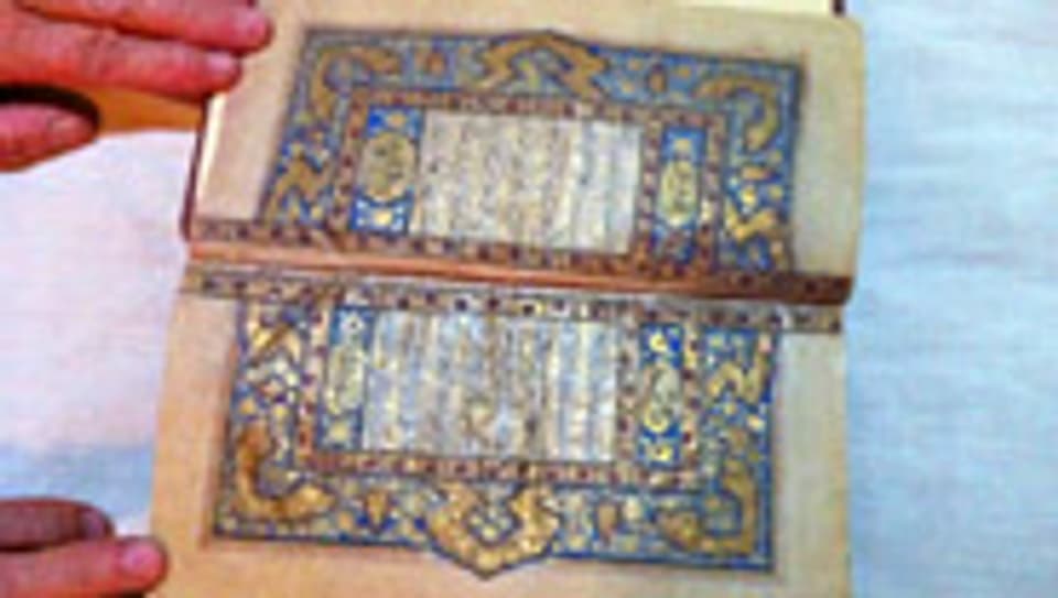Koran mit Miniaturen aus Gold.