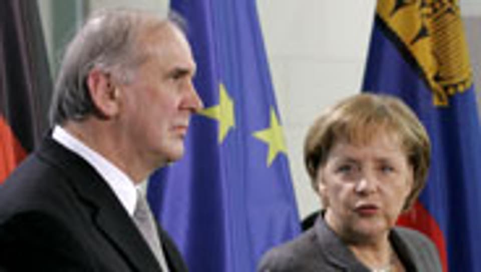 Otmar Hasler und Angela Merkel.