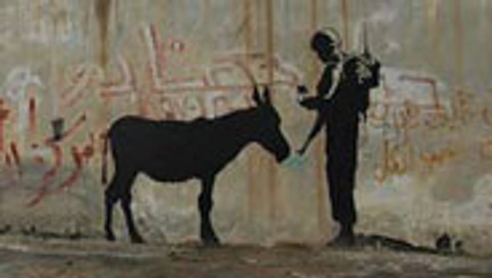 Banksys Kunst auf der Mauer.