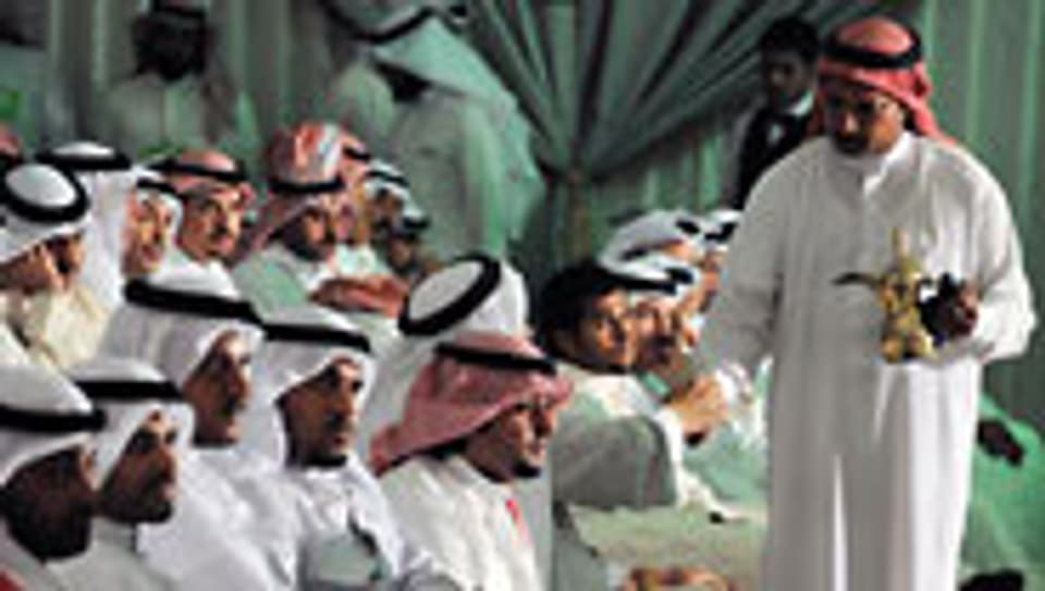 Kuwaitis wählen ein neues Parlament.