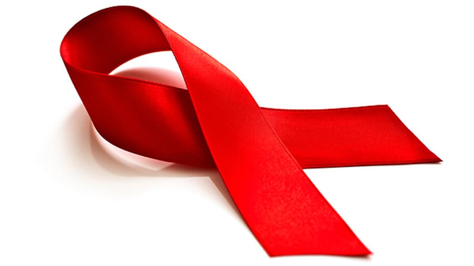 Die Rote Schleife als Zeichen der Solidarität mit HIV-Infizierten und AIDS-Kranken.