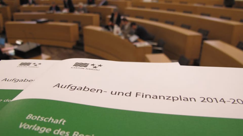 Der Aargauer Grosse Rat hat das Budget 2014 gutgehiessen. Der Steuerfuss des Kantons bleibt bei 94 Prozent.