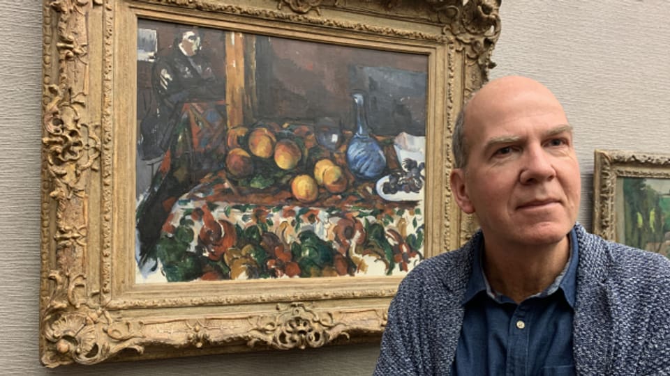 Langmatt-Direktor Markus Stegmann mit einem Bild von Paul Cézanne