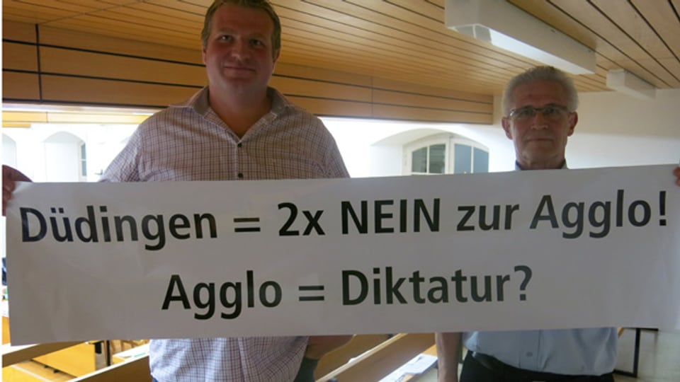 Protest nützt nichts - Düdingen muss in der Agglo Freiburg bleiben