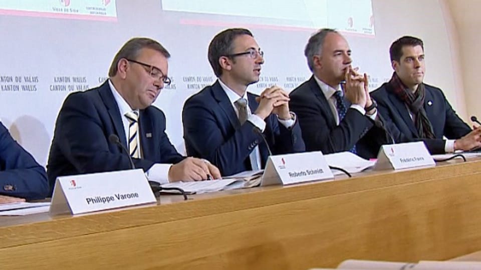  Finanzdirektor Roberto Schmidt (CSP), Sicherheitsdirektor Frédéric Favre (FDP) und Christophe Darbellay (CVP).