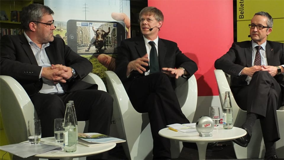 Eric Nussbaumer (SP), Gerhard Schafroth (Grünliberale), Thomas Weber (SVP) an einem Wahlpodium.