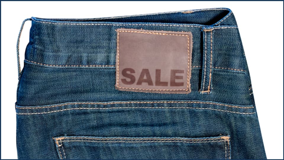 In Neuchâtel könnte auf diesem Paar Jeans in Zukunft beim Ausverkauf «Les soldes» stehen.