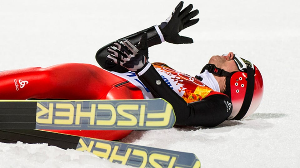 Als Verlierer muss man sich aufrappeln können: Skispringer Simon Ammann nach seinem verpatzten Finalsprung in Krasnaya Polyana, Sotschi.
