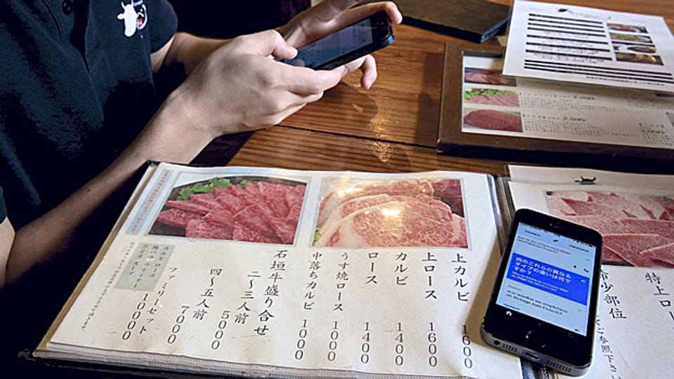 Nützliche Smartphone-Hilfe: Mit Google Translate funktioniert die Fleischbestellung auch für Analphabeten.