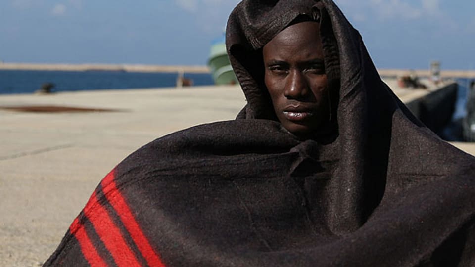 Ein Flüchtling an der libyschen Küste (Dezember 2015).