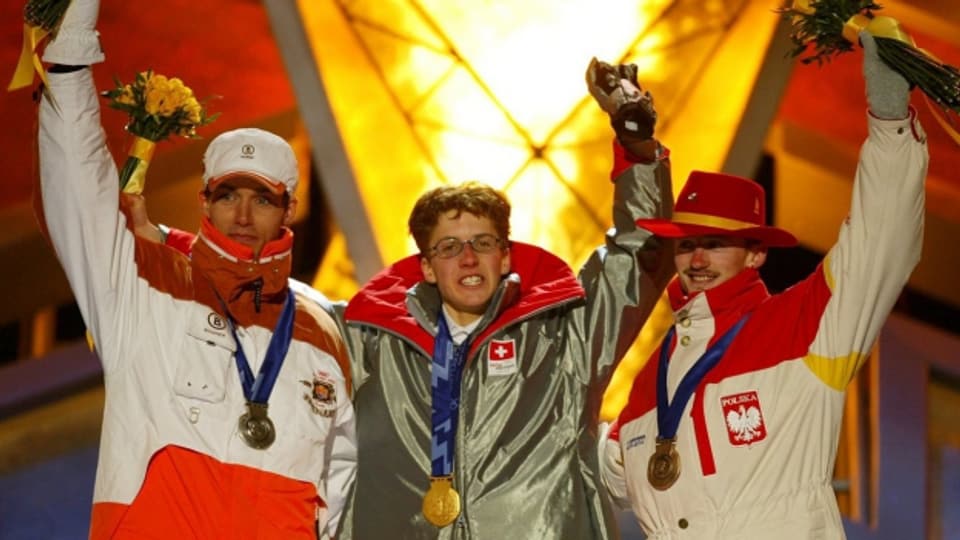 Simon Ammann holte 2002 in Salt Lake City zwei Goldmedaillen. Hier mit Sven Hannawald (Silber) und Adam Malysz (Bronze).