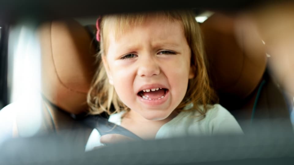 Lange Autofahrten können für Kinder zur Tortour werden - und somit auch für die Eltern.