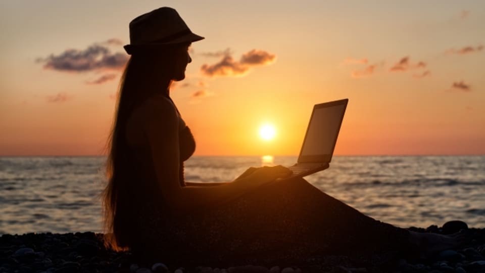 Arbeiten am Strand: Die Vorstellung ist manchmal romantischer als die Realität.