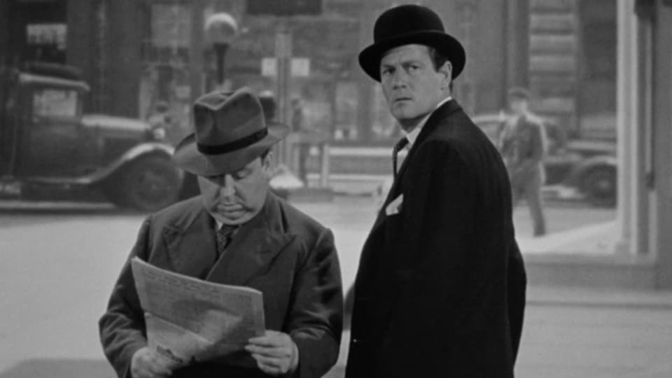 Alfred Hitchcock (links) hat einen Gastauftritt in seinem eigenen Film Foreign Correspondent