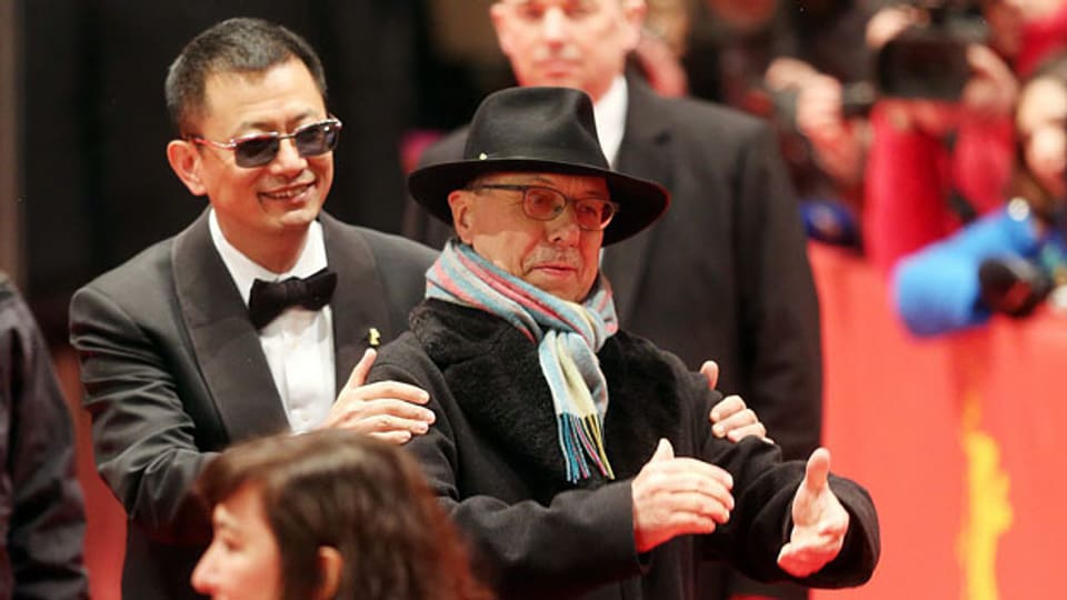 Jury Präsident Wong Kar Wei und Festival Direktor Dieter Kosslick auf dem roten Teppich der Berlinale.
