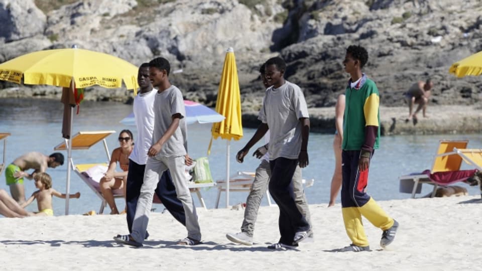 Flüchtlinge am Strand von Lampedusa.