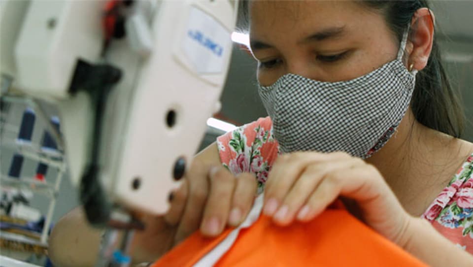 Textilarbeiter in Kambodscha arbeiten unter schlechten Konditionen.