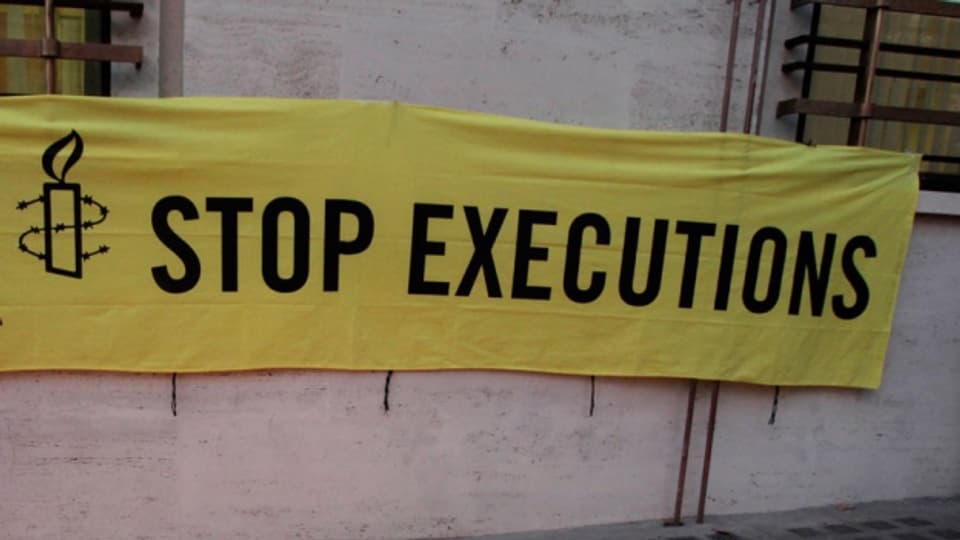 Ein Amnesty-Plakat gegen Todesstrafe.