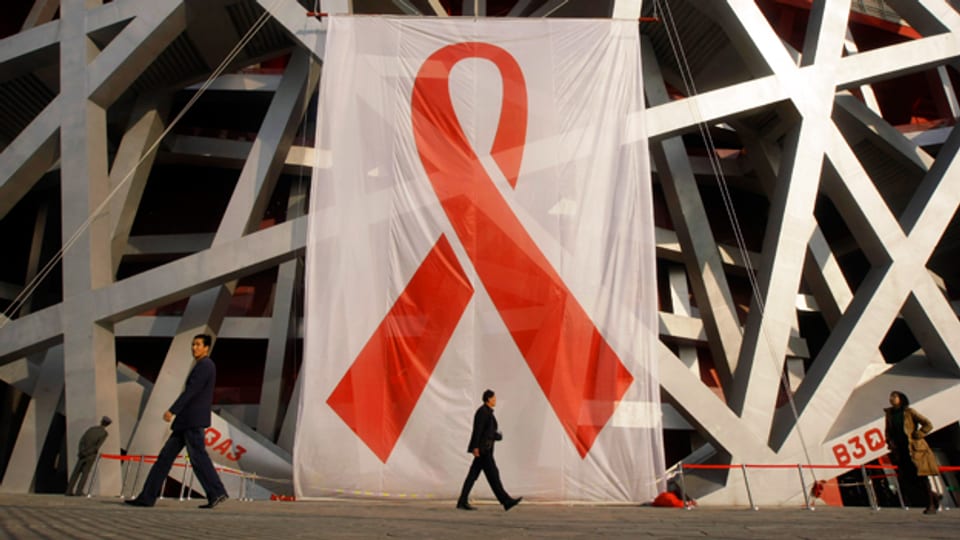 Ein Zeichen gegen Aids: Trotzdem sind die Betroffenen immer noch Opfer von Diskrimination.