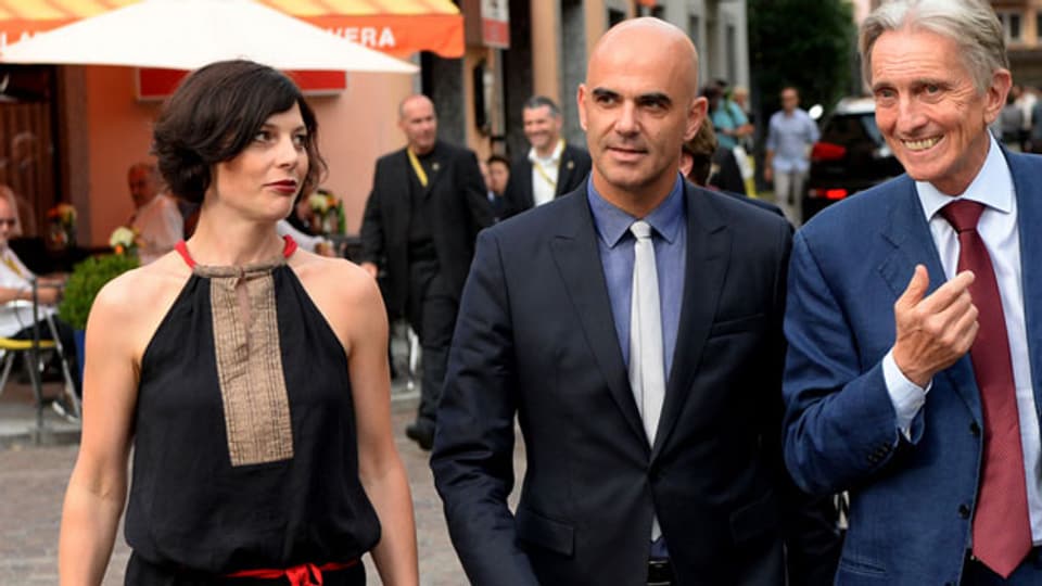 Bundesrat Alain Berset mit seiner Frau Muriel Zeender und Festivalpräsident Marco Solari am 67. Internationalen Filmfest von Locarno.