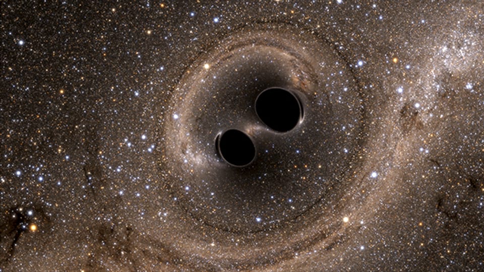 Die Kollision von zwei schwarzen Löchern konnte nun erstmals nachgewiesen werden.  Bild aus einer Computersimulation des Laser Interferometer Gravitational-Wave Observatory, publiziert am 11.2.2016.